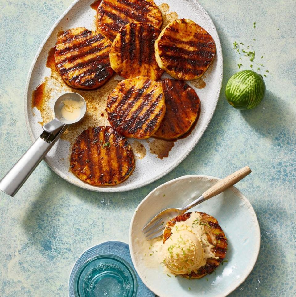 <p>Juicy pineapple dipped in coconut sugar and cinnamon, then grilled until golden and caramelized, is the perfect start-of-summer dessert.</p><p><em><a href="https://www.goodhousekeeping.com/food-recipes/dessert/a31915070/grilled-pineapple-recipe/" rel="nofollow noopener" target="_blank" data-ylk="slk:Get the recipe for Grilled Pineapple »;elm:context_link;itc:0;sec:content-canvas" class="link ">Get the recipe for Grilled Pineapple »</a></em></p><p><strong>RELATED: </strong><a href="https://www.goodhousekeeping.com/food-recipes/cooking/tips/g1935/cut-whole-pineapple/" rel="nofollow noopener" target="_blank" data-ylk="slk:How to Cut a Pineapple in a Few Easy Steps;elm:context_link;itc:0;sec:content-canvas" class="link ">How to Cut a Pineapple in a Few Easy Steps</a><br></p>