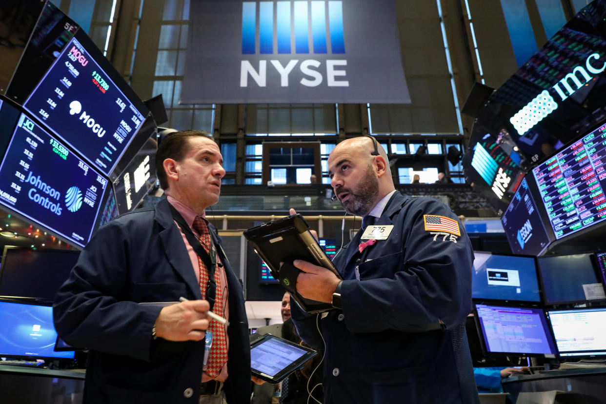 Traders work on the floor of the New York Stock Exchange (NYSE) in New York, U.S., December 7, 2018. REUTERS/Brendan McDermid