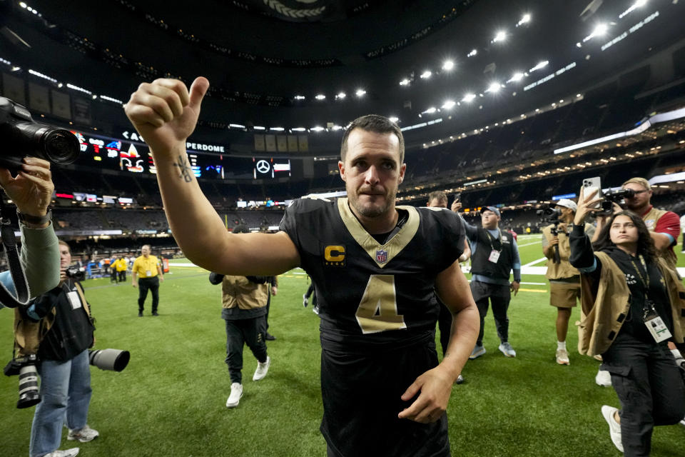 New Orleans Saints quarterback Derek Carr (4) leaves the field after the team's win against the Carolina Panthers following an NFL football game Sunday, Sept. 8, 2024, in New Orleans. (AP Photo/Gerald Herbert)