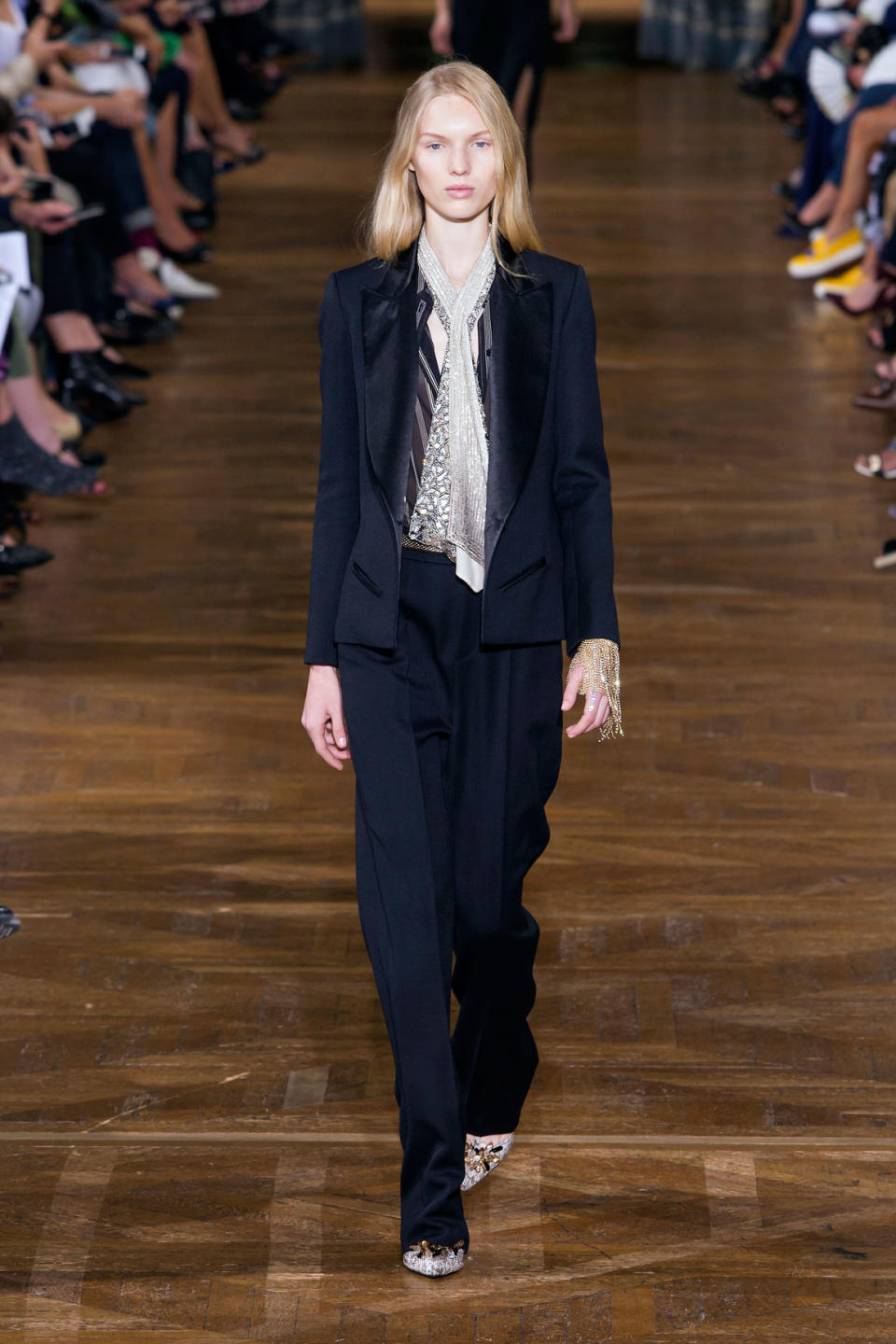 <p>From Paris Fashion Week to Bridal Fashion Week, the runways often share similar trends. For spring 2017, one of them was undeniably the pantsuit, which made it to Lanvin (in oyster charmeuse), <span>Chloé (in minimalist black and white) and Givenchy (with oversized pockets). The bridal market also introduced tailored white tuxedo suits in lieu of the traditional wedding gown. Looks like the industry is finally catching on.</span></p> <h4>Imaxtree</h4>