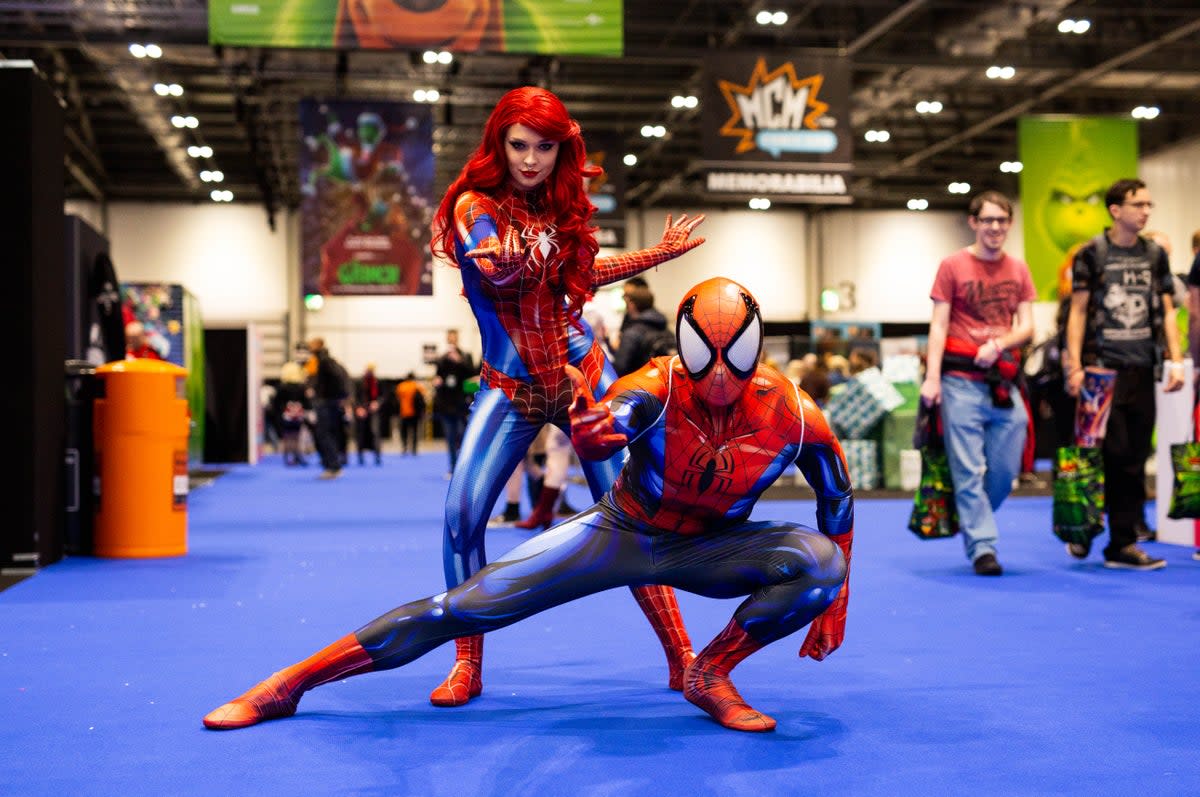 Fans of Spider-Man enjoy Comic Con (MCM Comic Con / Hand out)