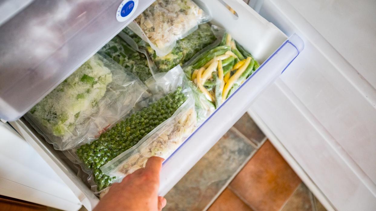 Freezer Drawer With Packed Vegetables.