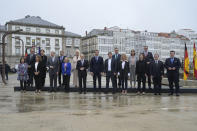 German Chancellor Olaf Scholz, fifth left, stands with Spanish Prime Minister Pedro Sanchez, sixth left, during a group photo at a summit in A Coruna, Spain, Wednesday, Oct. 5, 2022. Leaders of Spain and Germany are meeting in northwestern Spain for a one-day summit focusing on Europe's energy crisis and consequences of the Russian invasion of Ukraine. (M.Dylan/Europa Press via AP)