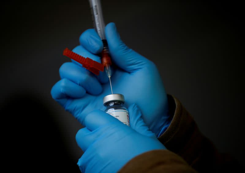 FILE PHOTO: At a free drive-through coronavirus disease (COVID-19) vaccine clinic run by the Jamestown S'Klallam Tribe in Sequim