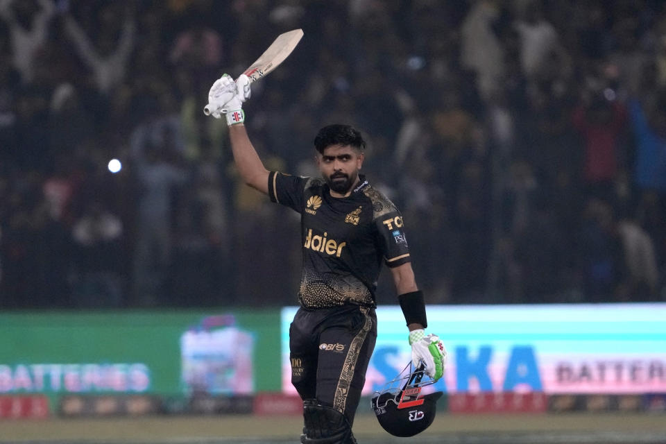 Peshawar Zalmi' Babar Azam celebrates after scoring century during the Pakistan Super League T20 cricket match between Peshawar Zalmi and Islamabad United, in Lahore, Pakistan, Monday, Feb. 26, 2024. (AP Photo/K.M. Chaudary)