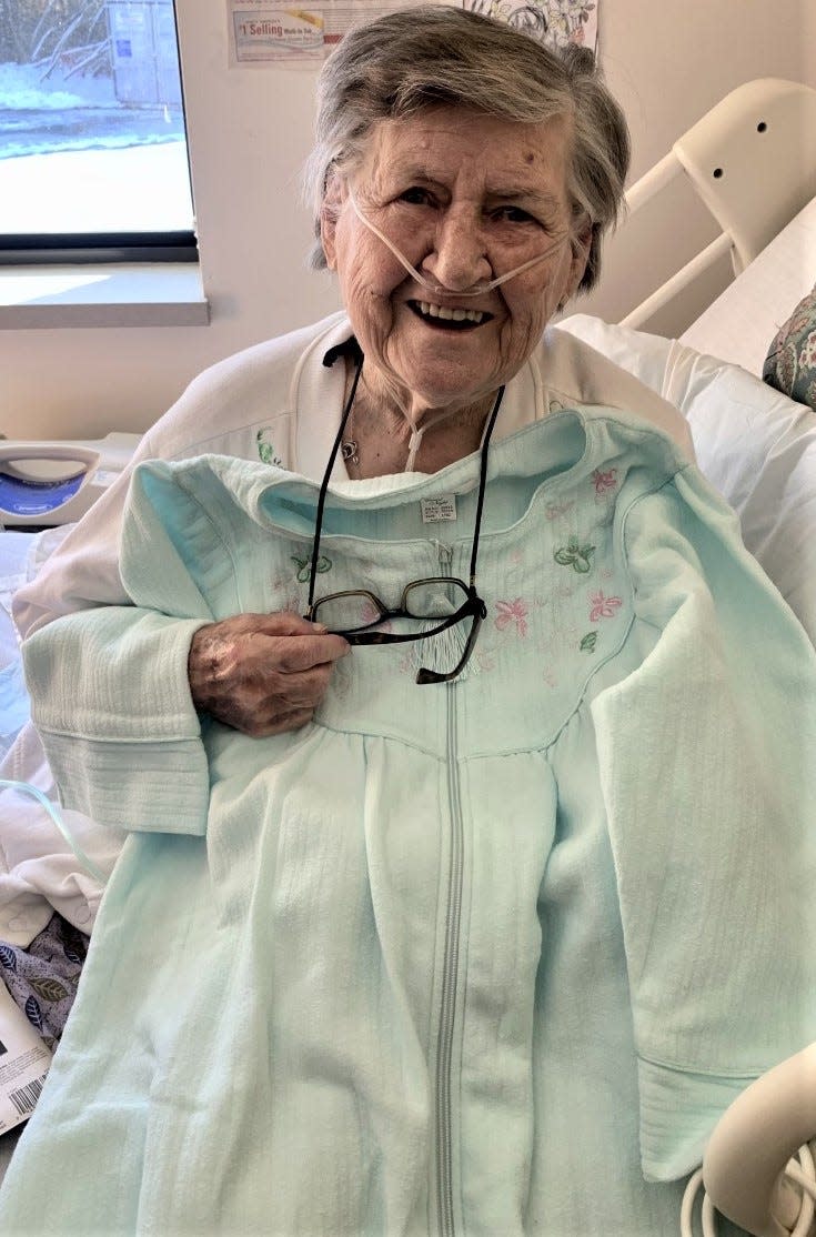 Thanks to online ordering and next-day delivery, Adele Dombrowski's granddaughters could pamper her during her final months. Here she receives a new nightgown.