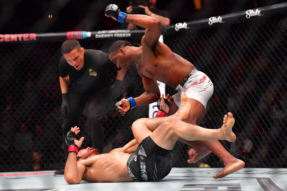 Feb 17, 2024; Anaheim, California, USA; Danny Barlow moves in with a hit against Josh Quinlan during UFC 298 at Honda Center. Mandatory Credit: Gary A. Vasquez-USA TODAY Sports