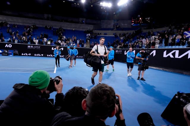 Andy Murray leaves Margaret Court Arena in the early hours