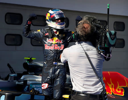 Formula One - F1 - Malaysia Grand Prix - Sepang, Malaysia- 2/10/16 Red Bull's Daniel Ricciardo of Australia celebrates winning the race. REUTERS/Edgar Su