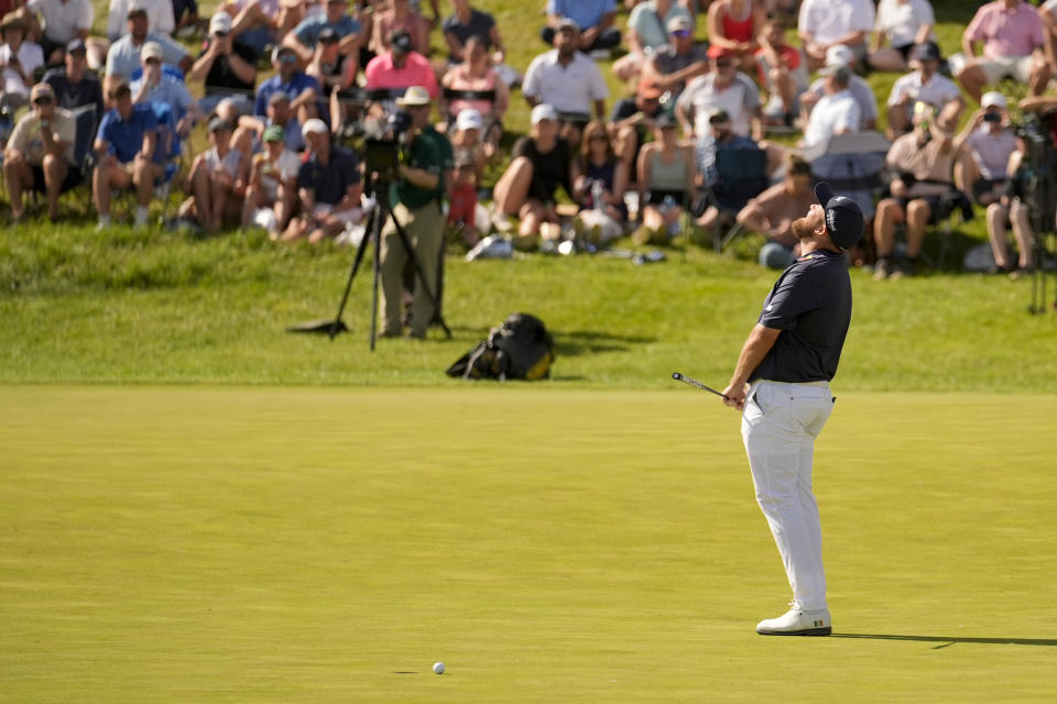 Shane Lowry, of Ireland, reacts after missing a birdie putt on the 18th hole during the third round of the PGA Championship golf tournament at the Valhalla Golf Club, Saturday, May 18, 2024, in Louisville, Ky. (AP Photo/Jeff Roberson)