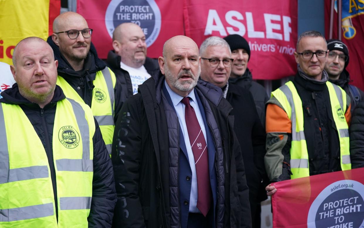 Aslef general secretary Mick Whelan (centre) on the picket line at Waterloo station in London