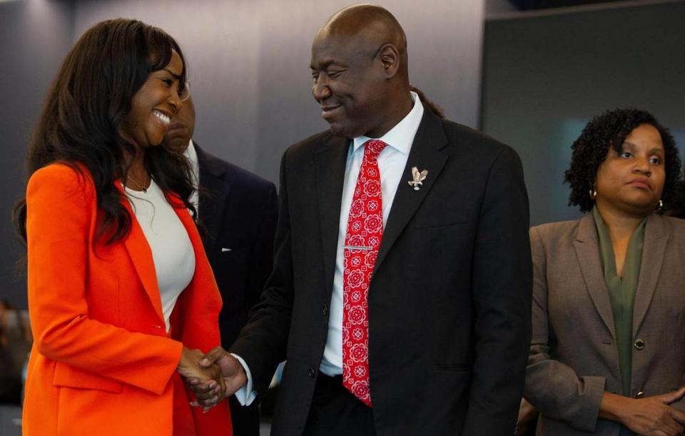 Attorney Sue-Ann Robinson shakes attorney Benjamin Crump’s hand during a press conference held to urge President Biden to nominate a Black female judge to replace Judge Marcia Cook, who died this year, at Carlton Fields on Tuesday, June 27, 2023 in Miami, Florida. Lauren Witte/lwitte@miamiherald.com