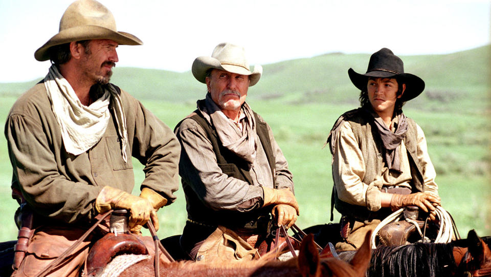 Kevin Costner, Robert Duvall, and Diego Luna in OPEN RANGE, 2003.