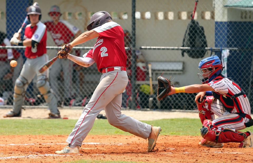 Dylan McDonald of the Sarasota U15 All-Stars connects for a hit against the Okeeheelee All-Stars on Sunday, July 17, 2002, in the South Florida State Championship game at the Sarasota BRL field.