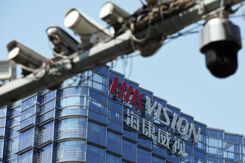 FILE PHOTO: Surveillance cameras are seen near the headquarters of Chinese video surveillance firm Hikvision in Hangzhou