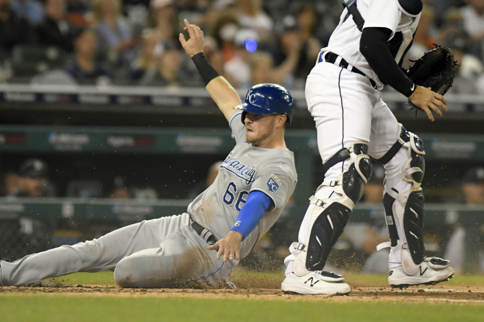 Kansas City Royals' Ryan O'Hearn slides safely home on a sacrifice fly from Whit Merrifield in the third inning of a baseball game against the Detroit Tigers, Friday, Sept. 24, 2021, in Detroit. (AP Photo/Jose Juarez)