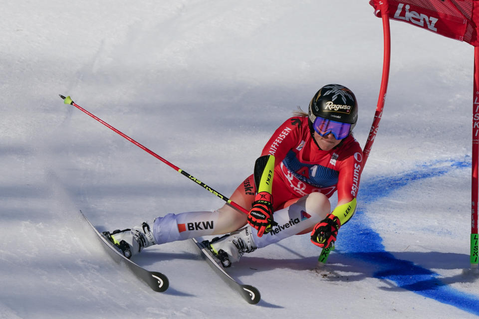 Switzerland's Lara Gut Behrami speeds down the course during an alpine ski, women's World Cup giant slalom race, in Lienz, Austria, Thursday, Dec. 28, 2023. (AP Photo/Pier Marco Tacca)