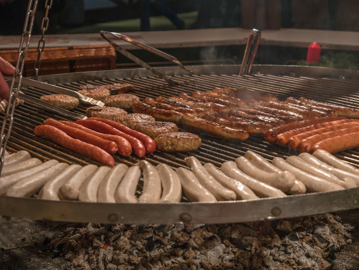 Traditional German grilled sausages at Christmas market, Germany, December