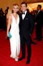 Claire Danes was the guest of J. Mendel – and she wore a low-cut asymmetrical white gown from his Fall 2012 collection – but she brought along her Prada-clad husband Hugh Dancy as her date.