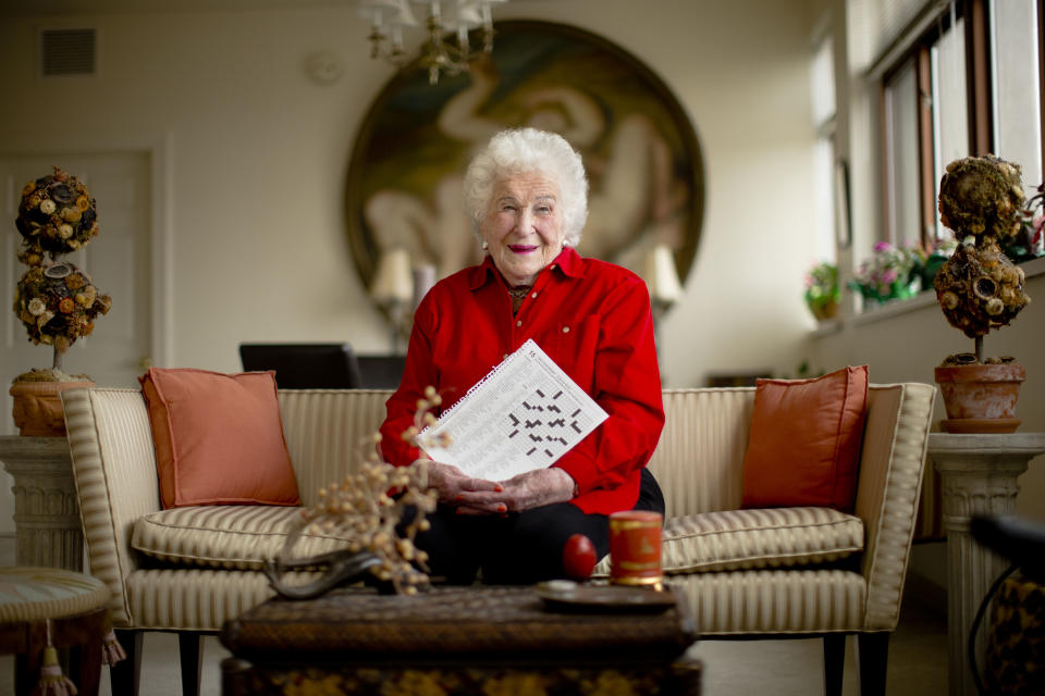 Longtime crossword constructor Bernice Gordon born on Jan. 11, 1914, poses for a portrait at her home, Tuesday, Dec. 31, 2013, in Philadelphia. The New York Times is scheduled publish one of her puzzles, making her the first centenarian ever to have a grid printed in the paper. Gordon’s feat comes not long after the centennial of the puzzle itself. (AP Photo/Matt Rourke)