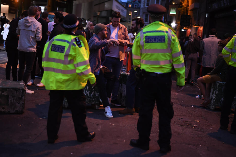 Police officer in Borough Market, London, as coronavirus lockdown restrictions are eased across England.