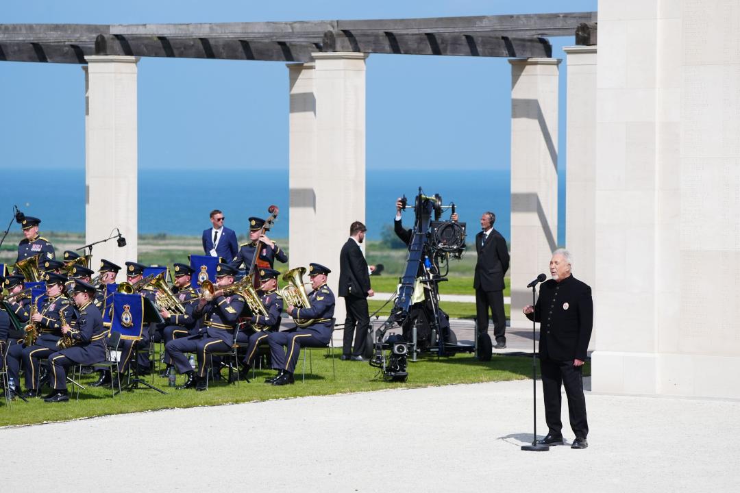 Sir Tom Jones performs during the UK national commemorative event for the 80th anniversary of D-Day, held at the British Normandy Memorial in Ver-sur-Mer, Normandy, France. Picture date: Thursday June 6, 2024.