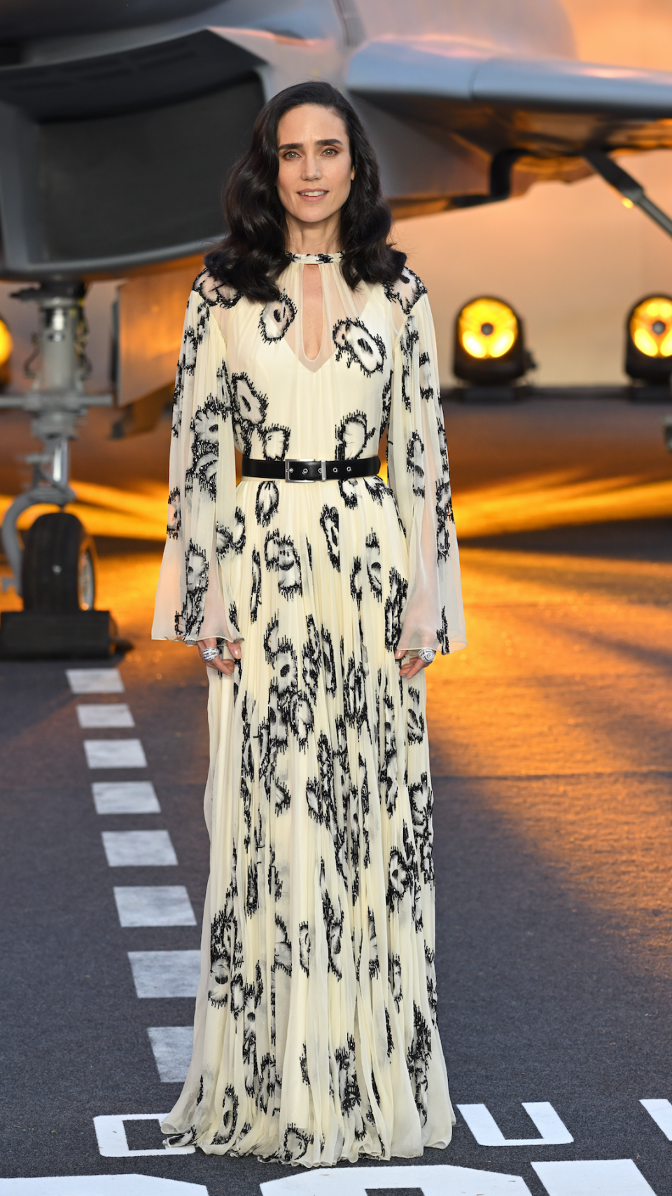 <p> Looking like a certified Hollywood star, Connelly wowed at the Royal Performance of Top Gun: Maverick in London in 2022. The actress was radiant in an ivory long-sleeved Louis Vuitton gown, which featured an edgy black print and a cut-out neckline, as well as elegant draping and a black belt to cinch in her waist. </p>