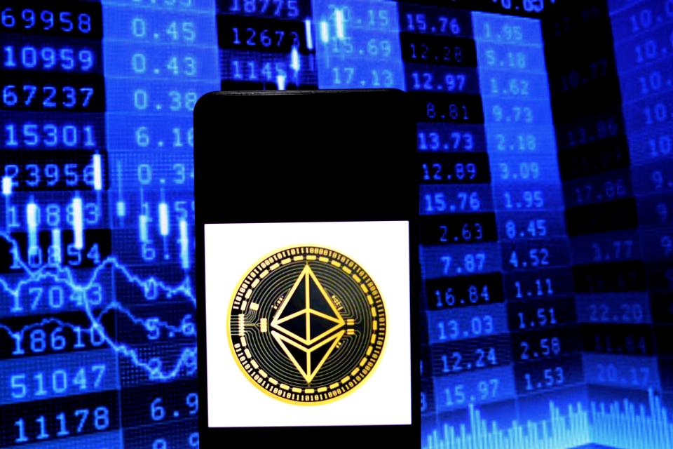 INDIA - 2021/05/11: In this Photo illustration Ethereum logo is seen displayed on a smartphone screen with a pc screen background. (Photo Illustration by Avishek Das/SOPA Images/LightRocket via Getty Images)