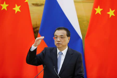 FILE PHOTO: Chinese Premier Li Keqiang attends a joint news conference with Russian Prime Minister Dmitry Medvedev (not pictured) at the Great Hall of the People in Beijing November 7, 2018. REUTERS/Thomas Peter/Pool