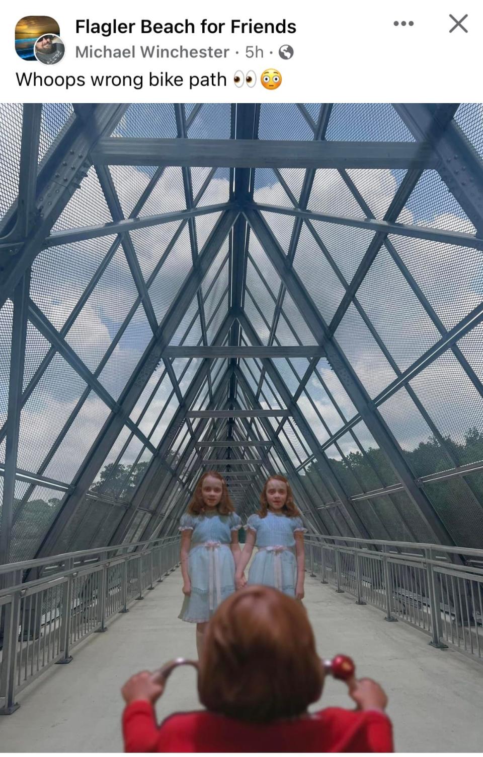 The two girls from the 1980 horror movie "The Shining" pay a visit to the new pedestrian bridge in this meme by Michael Winchester.