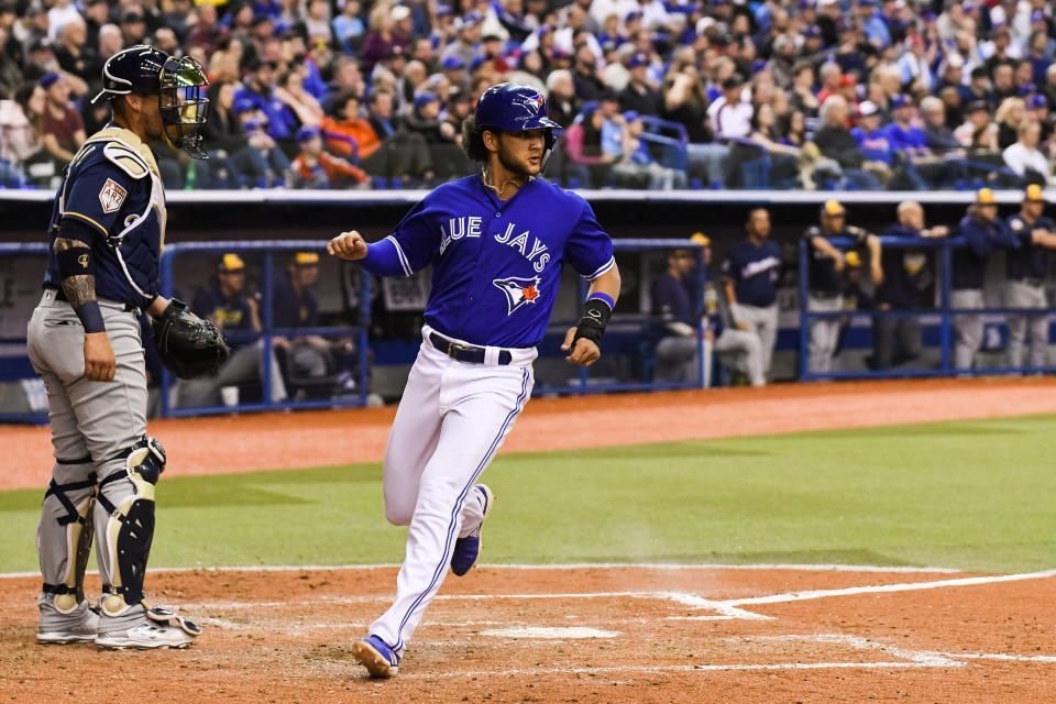 MONTREAL, QC - MARCH 25: Toronto Blue Jays infielder Bo Bichette (66) scores a run during the Milwaukee Brewers versus the Toronto Blue Jays spring training game on March 25, 2019, at Olympic Stadium in Montreal, QC (Photo by David Kirouac/Icon Sportswire via Getty Images)