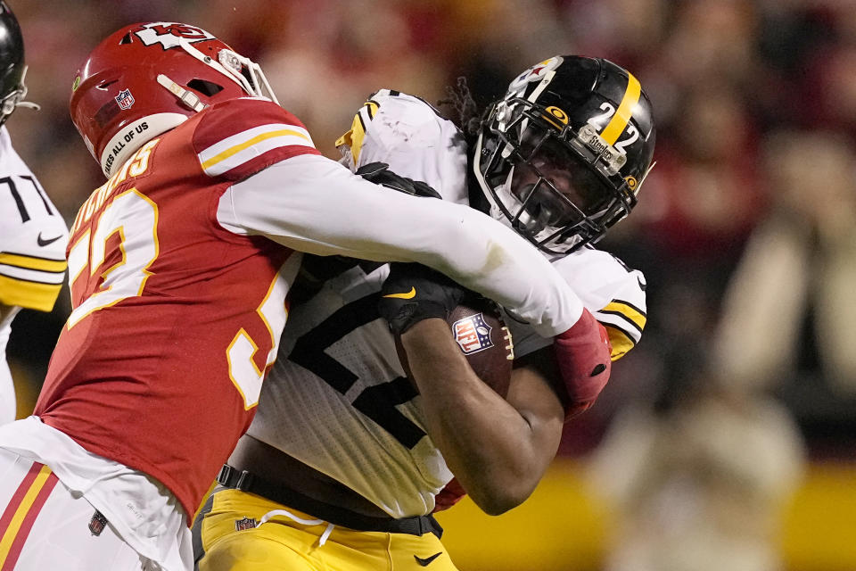 Pittsburgh Steelers running back Najee Harris, right, is stopped by Kansas City Chiefs middle linebacker Anthony Hitchens during the second half of an NFL football game Sunday, Dec. 26, 2021, in Kansas City, Mo. (AP Photo/Charlie Riedel)