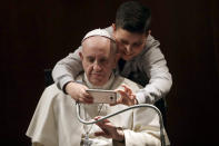 <p>A boy takes a selfie with Pope Francis, during a visit to the parish of Santa Maria Josefa del Cuore di Gesu’, in Rome, Feb. 19, 2017. (Photo: Alessandra Tarantino/AP) </p>