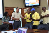 Jamaica's Prime Minister Andrew Holness meets with members from the National Works Agency, as Jamaicans brace on Saturday for the arrival of Hurricane Matthew in Kingston, Jamaica, October 1, 2016. REUTERS/Gilbert Bellamy