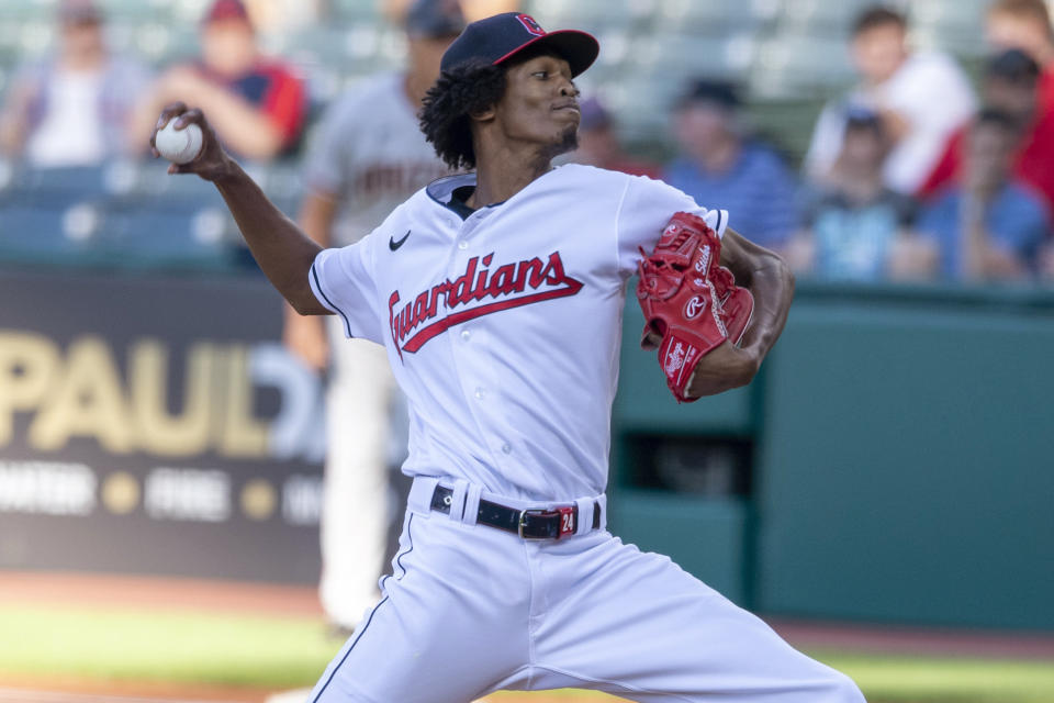 Cleveland Guardians starting pitcher Triston McKenzie delivers during the first inning of the team's baseball game against the Arizona Diamondbacks, Tuesday, Aug. 2, 2022, in Cleveland. (AP Photo/David Dermer)