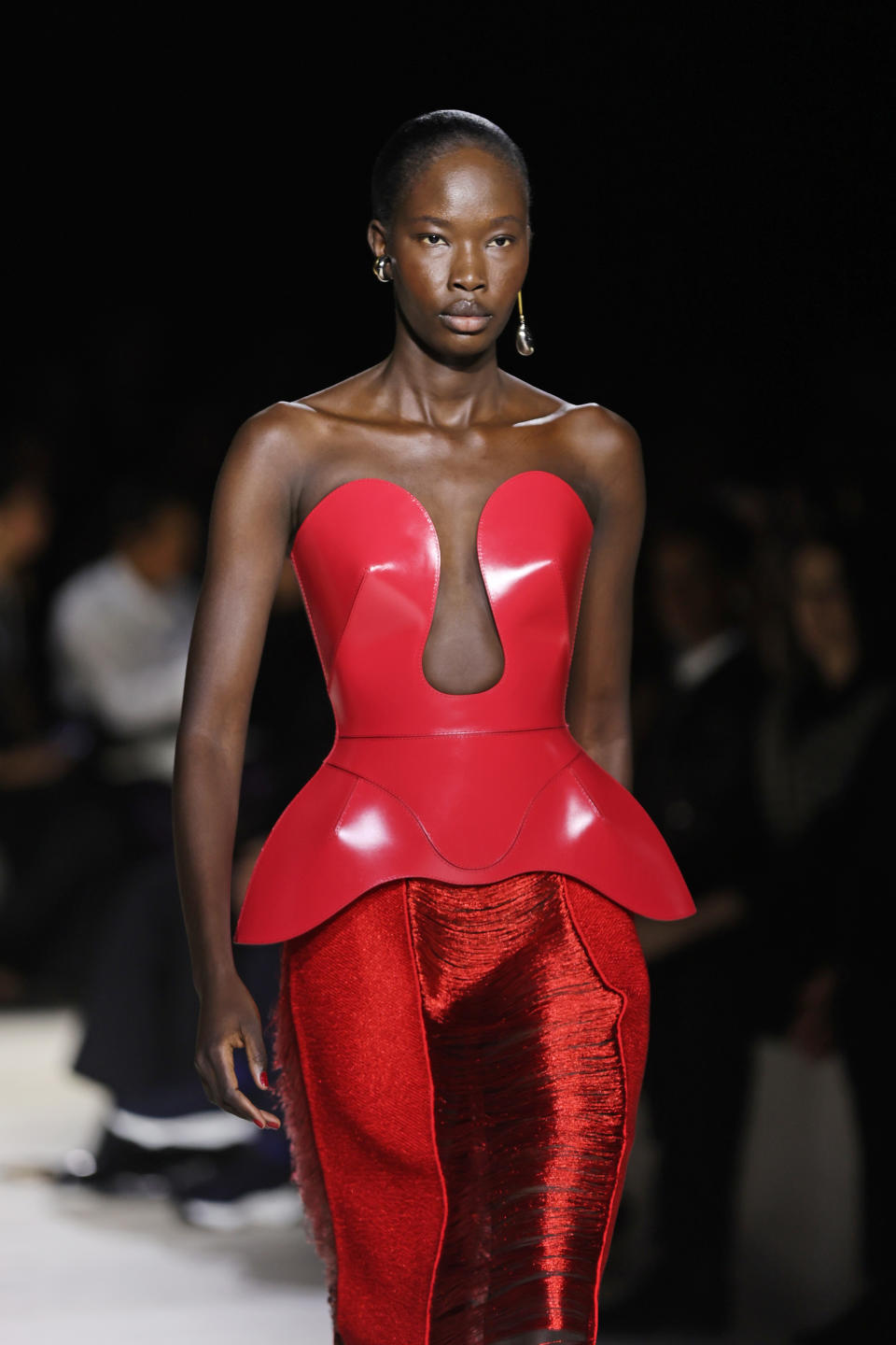 Model Adhel Bol walks the Alexander McQueen SS24 show during Paris Fashion Week.