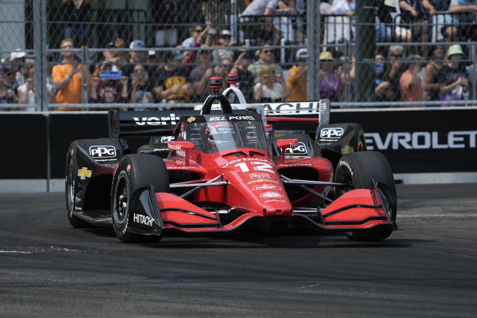 Will Power (12) makes a turn during the IndyCar Detroit Grand Prix auto race in Detroit, Sunday, June 4, 2023. (AP Photo/Paul Sancya)