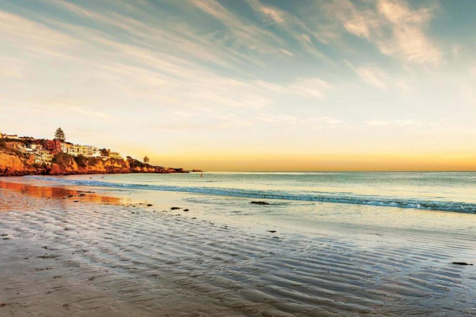 Hit the surf with a paddle yoga class