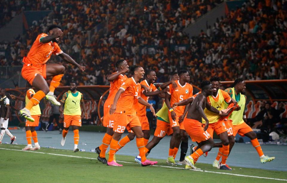 The hosts celebrate Oumar Diakite’s late winner against Mali (Reuters)