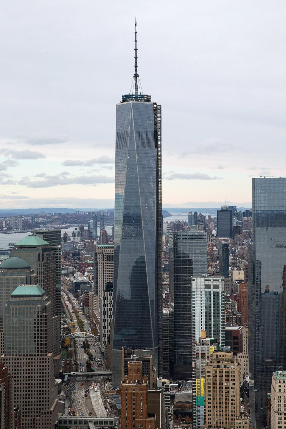 NEW YORK, NY - NOVEMBER 12:  One World Trade Center towers over lower Manhattan on November 12, 2013 in New York City. The building was deemed the tallest building in North America today; the title was previously held by Willis Tower in Chicago (previously titled Sears Tower).  (Photo by Andrew Burton/Getty Images)