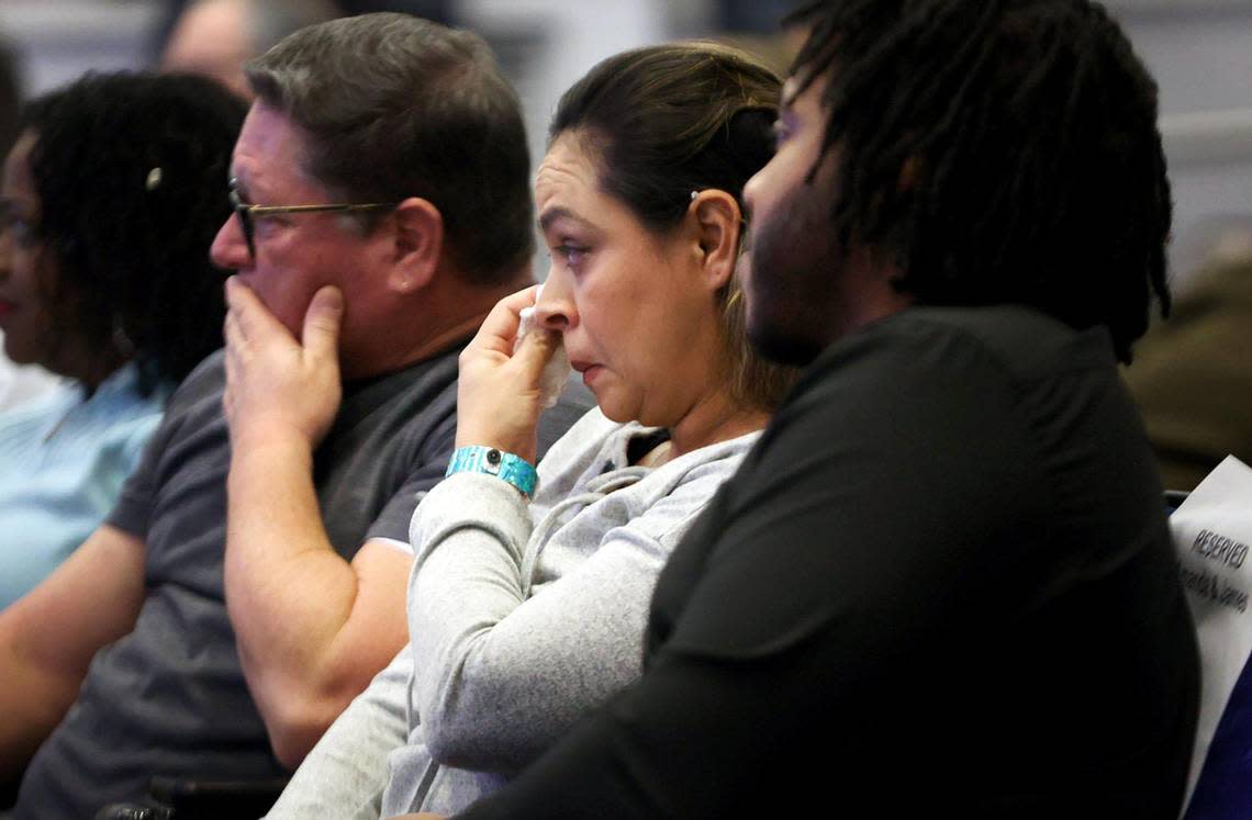 Amanda Arciniega, center, and James Finley, parents of formerly conjoined twin girls, JamieLynn and AmieLynn, watch a video montage of the experience of surgically separating them during a press conference at Cook Children’s Medical Center on Wednesday, January 25, 2023.