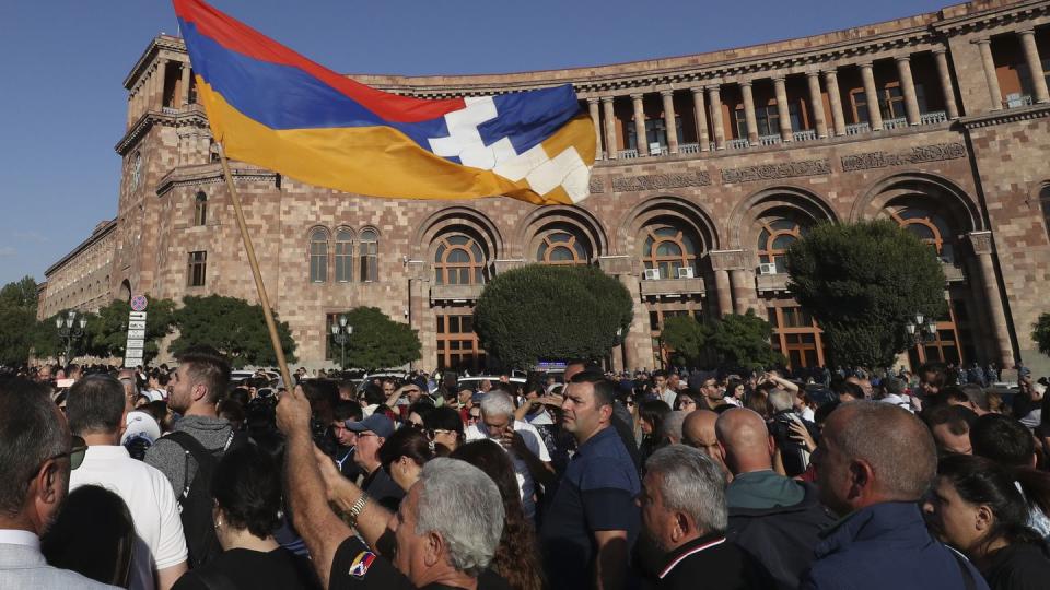 People gather at the Armenia government building to protest against Prime Minister Nikol Pashinyan in Yerevan, Armenia, Sept. 19, 2023. (Vahram Baghdasaryan/Photolure via AP)