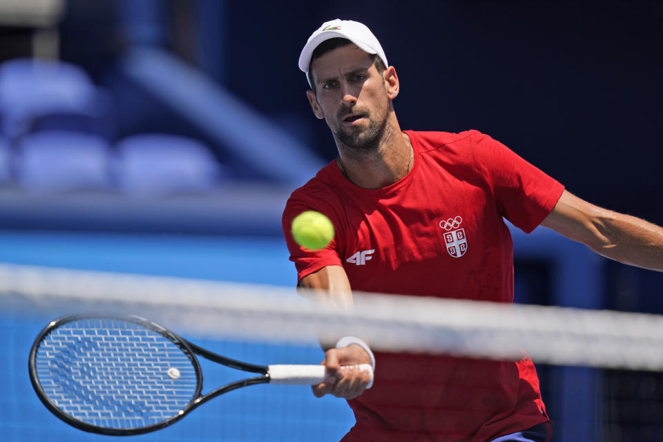 Novak Djokovic, of Serbia, practices at the Ariake Tennis Center ahead of the 2020 Summer Olympics, Friday, July 23, 2021, in Tokyo, Japan. (AP Photo/Seth Wenig)