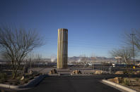 A towering memorial, in the form of a giant candle, to the victims of the August 2019 mass shooting in El Paso, Texas, is pictured on Wednesday, Feb. 8, 2023. Patrick Crusius, the defendant in the deaths of 23 people at an El Paso Walmart is expected to plead guilty during a re-arraignment hearing in federal court. (AP Photo/Andrés Leighton)