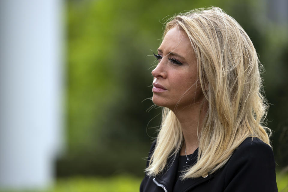 White House press secretary Kayleigh McEnany listens as lawmakers talk about the coronavirus spending bill after meeting with President Donald Trump at White House, Tuesday, April 21, 2020, in Washington. (AP Photo/Evan Vucci)