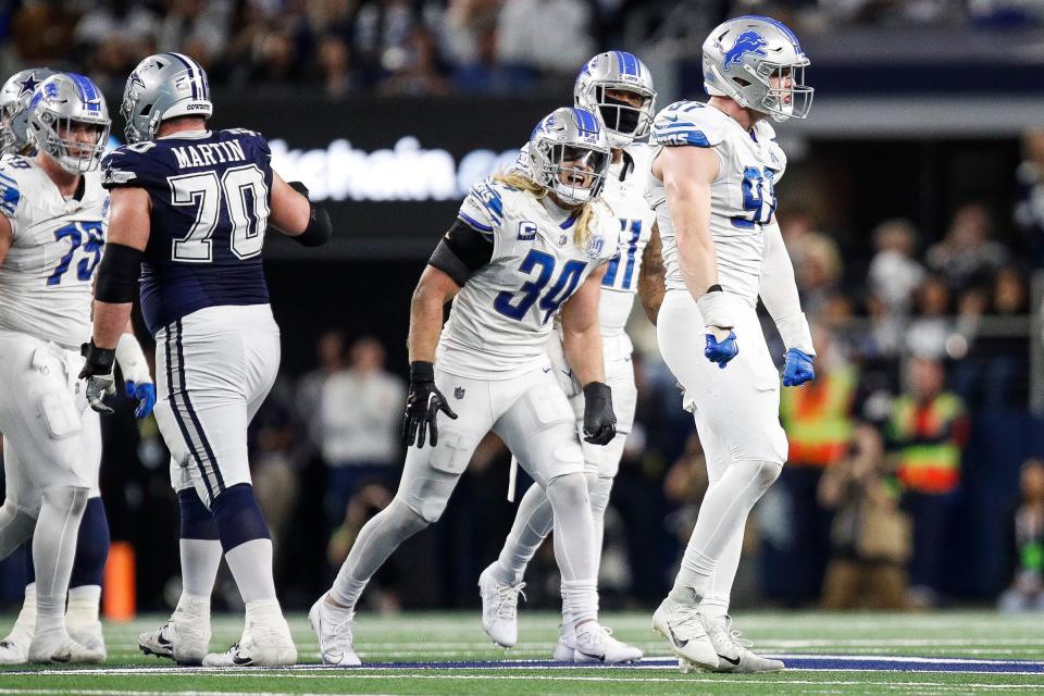 Lions defensive end Aidan Hutchinson celebrates a sack of Cowboys quarterback Dak Prescott during the second half of the Lions' 20-19 loss at AT&T Stadium in Arlington, Texas on Saturday, Dec. 30, 2023.