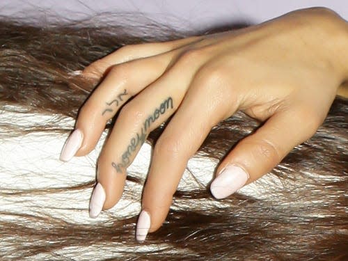 Ariana Grande finger tattoos