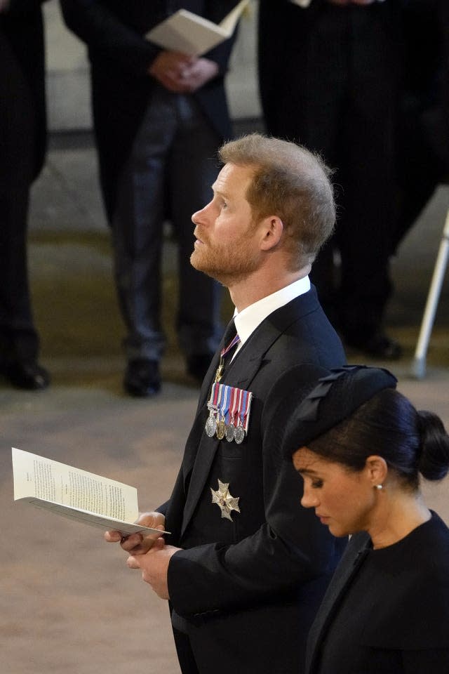 Harry and Meghan during the service