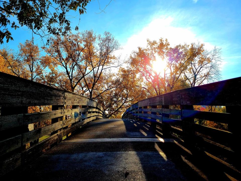 Dawn rises over a walking trail in Fort Wayne, IN via Getty Images