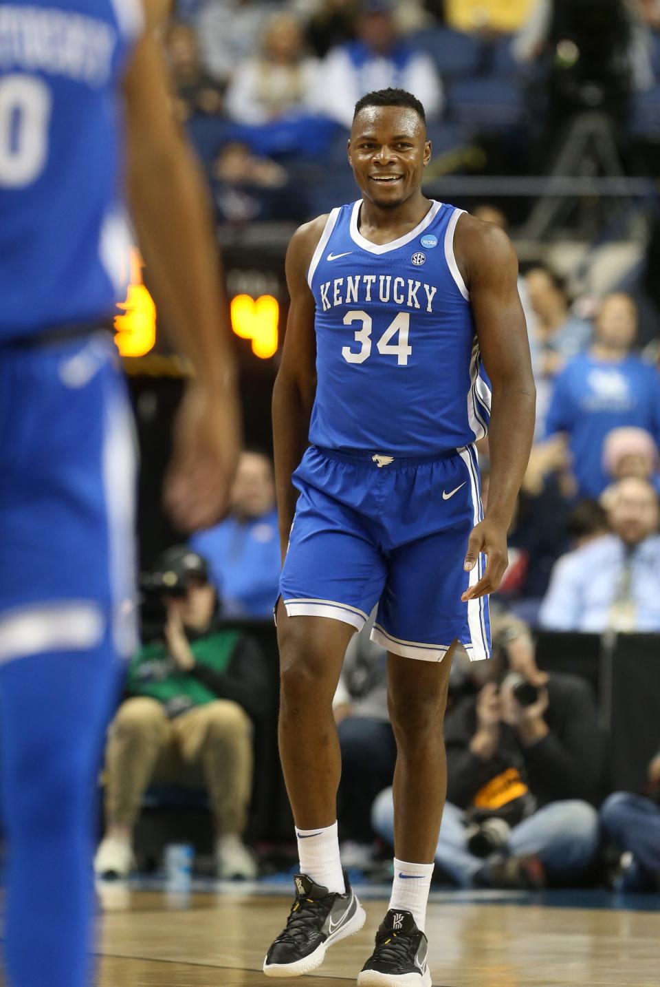 Kentucky’s Oscar Tshiebwe celebrates scoring against Kansas State in the second round of the NCAA Tournament.March 19, 2023